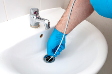 Drain Cleaning Is a Service That Removes Grease That Stops Sinks and Tubs From Draining Properly